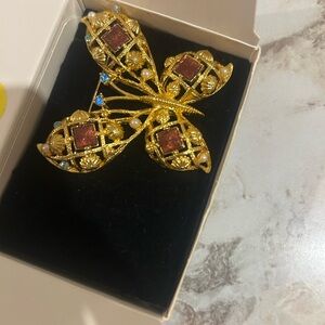 Elegant Gold Butterfly Brooch with Red Accents